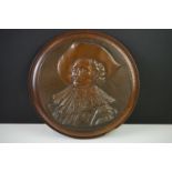 Bronze Circular Plaque depicting the Laughing Cavalier in relief, 22cm diameter mounted on a