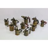 A collection of vintage brass blow torches to include Burmos and Primus examples.