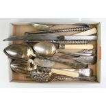 A small collection of antique silver plated cutlery to include serving spoons, basting spoon,