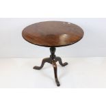 George III Mahogany Circular Tilt Top Supper Table raised on a turned column with three splay