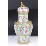 Chinese Cantonese Famille Rose Baluster Jar and Cover decorated with panels of figures and panels of