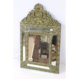 18th century style Dutch Pressed Brass Cushion Framed Mirror with scrolling foliate decoration, 66cm