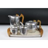 A mid 20th century Picquot ware tea set comprising of teapot, water jug, sugar bowl, cream jug and