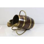 Oak Coopered Barrel and Brass Bound Ale Jug with brass handle and stand, 59cm long x 43cm high