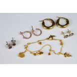 Alex Munroe Charm Bracelet, Pair of Rose Metal Hoop Earrings, Pair of Yellow Metal Hoop Earrings,