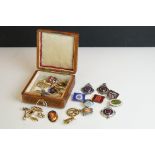 Collection of pocket watch fobs, enamel badges & yellow metal charms