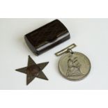 An early 20th century bakelite pocket snuff box together with a antique general improvement medal