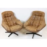 Pair of Mid century Retro Danish Brown Tan Leather Bucket Swivel Chairs designed for H W Klein for