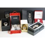 A collection of gents and ladies fashion watches all within original boxes to include Casio and