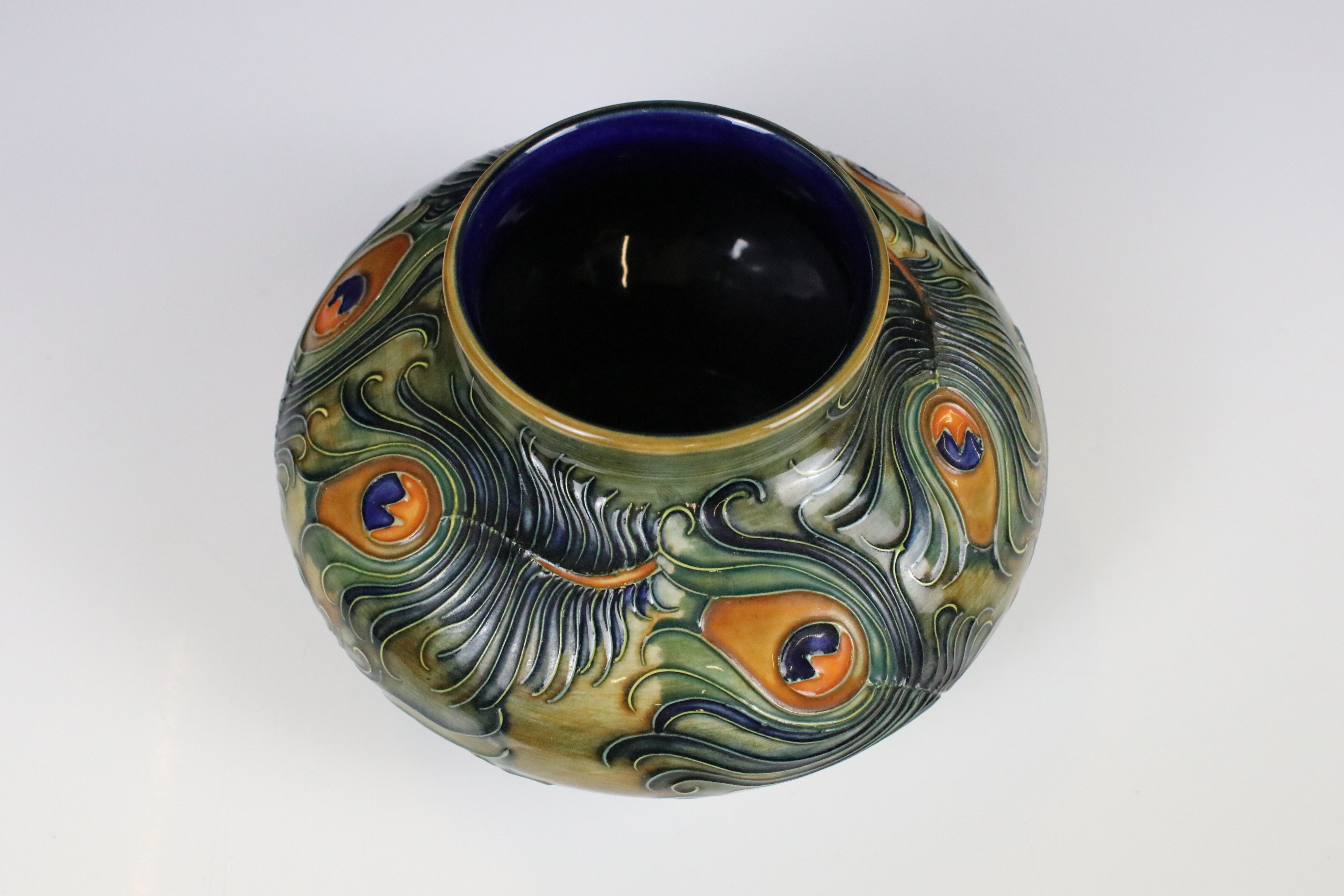 Moorcroft Pottery Squat Vase decorated in the Peacock Feathers pattern, impressed marks to base - Image 2 of 8