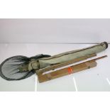 A collection of vintage fishing tackle to include split cane fishing rod.