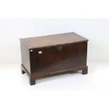 18th century Oak Coffer with hinged lid raised on bracket feet, 81cm wide x 44cm deep x 49cm high