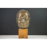 Bronze Bust of Sir Winston Churchill raised on a wooden plinth, 20cm high