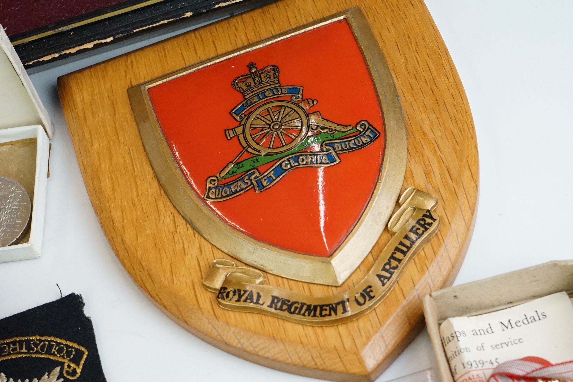 A group of military collectables to include a framed set of Royal Army Ordnance corps badges, a - Image 14 of 15