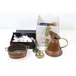 A box of mixed collectables to include a large copper jug, brass candlestick, pewter tankard and a