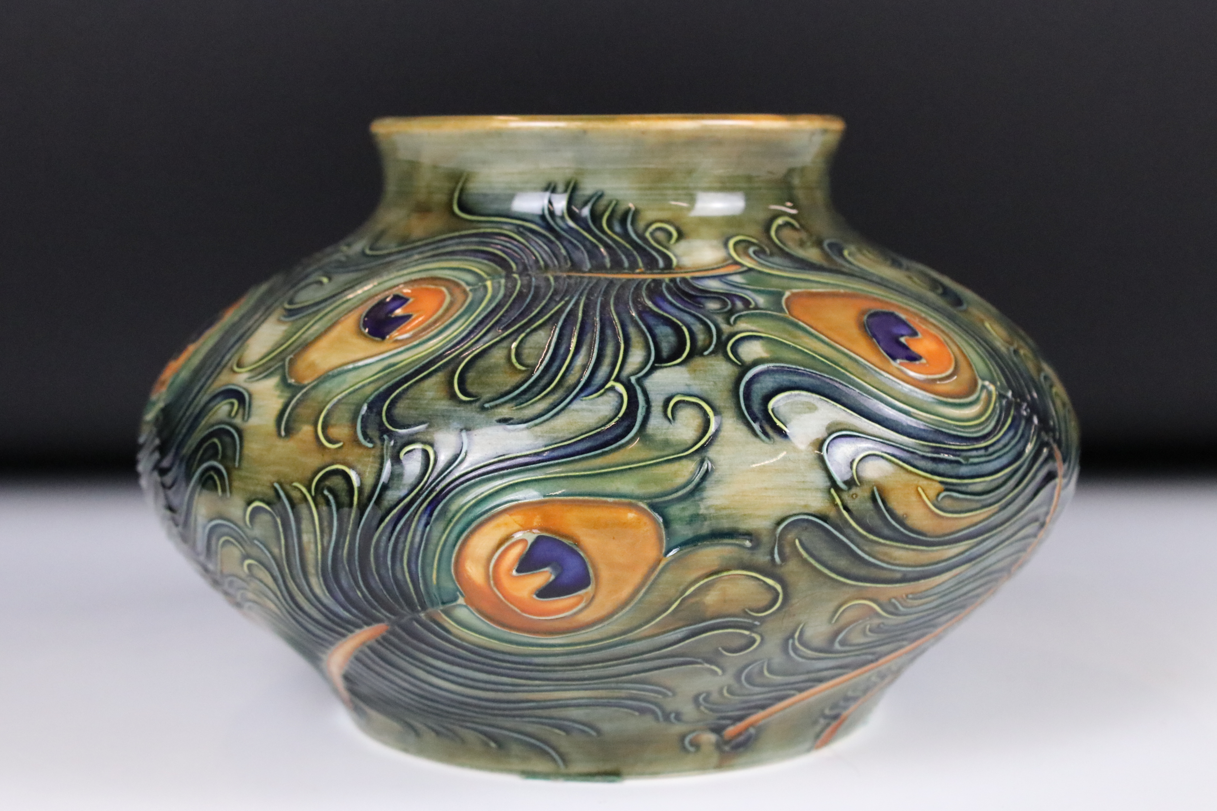 Moorcroft Pottery Squat Vase decorated in the Peacock Feathers pattern, impressed marks to base - Image 6 of 8