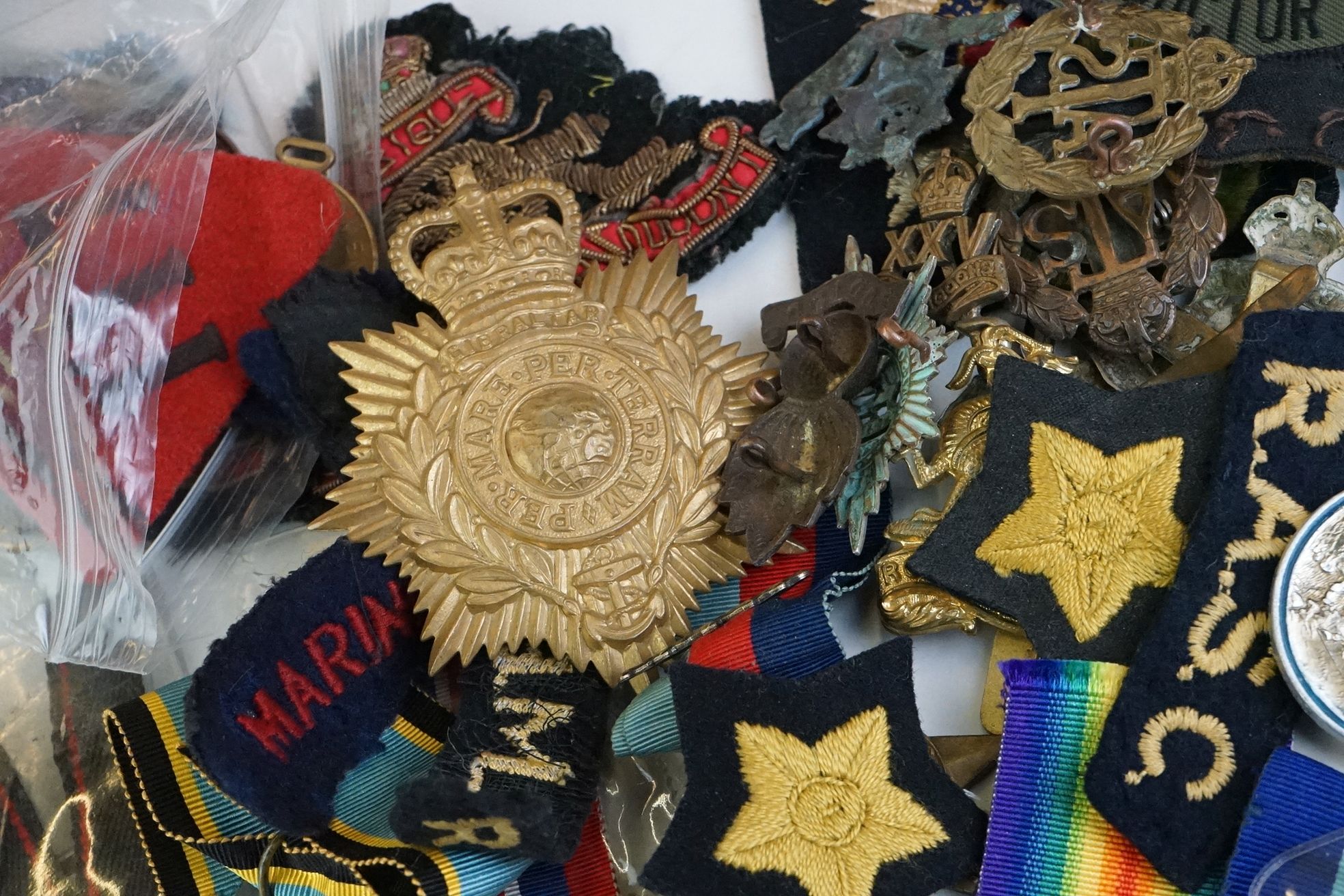 A group of military collectables to include a framed set of Royal Army Ordnance corps badges, a - Image 13 of 15
