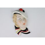 Royal Dux Porcelain Face Mask in the form of an Art Deco Lady wearing a beret and scarf, stamped