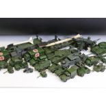 Over 25 Dinky mid 20th C military diecast models to include Supertoys 660 Tank Transporter, 688
