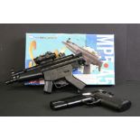 Three plastic toy BB guns to include a boxed Super UHC MMP5 A5 Mini Machine Gun