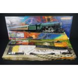 Two boxed Hornby OO gauge train sets to include R726 The Railfreight and R1001 Flying Scotsman, both