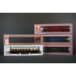 Four boxed Lima OO gauge locomotives to include 205128MWG Rapid, 205127MWG Dragon, 205132A2 Rail Car