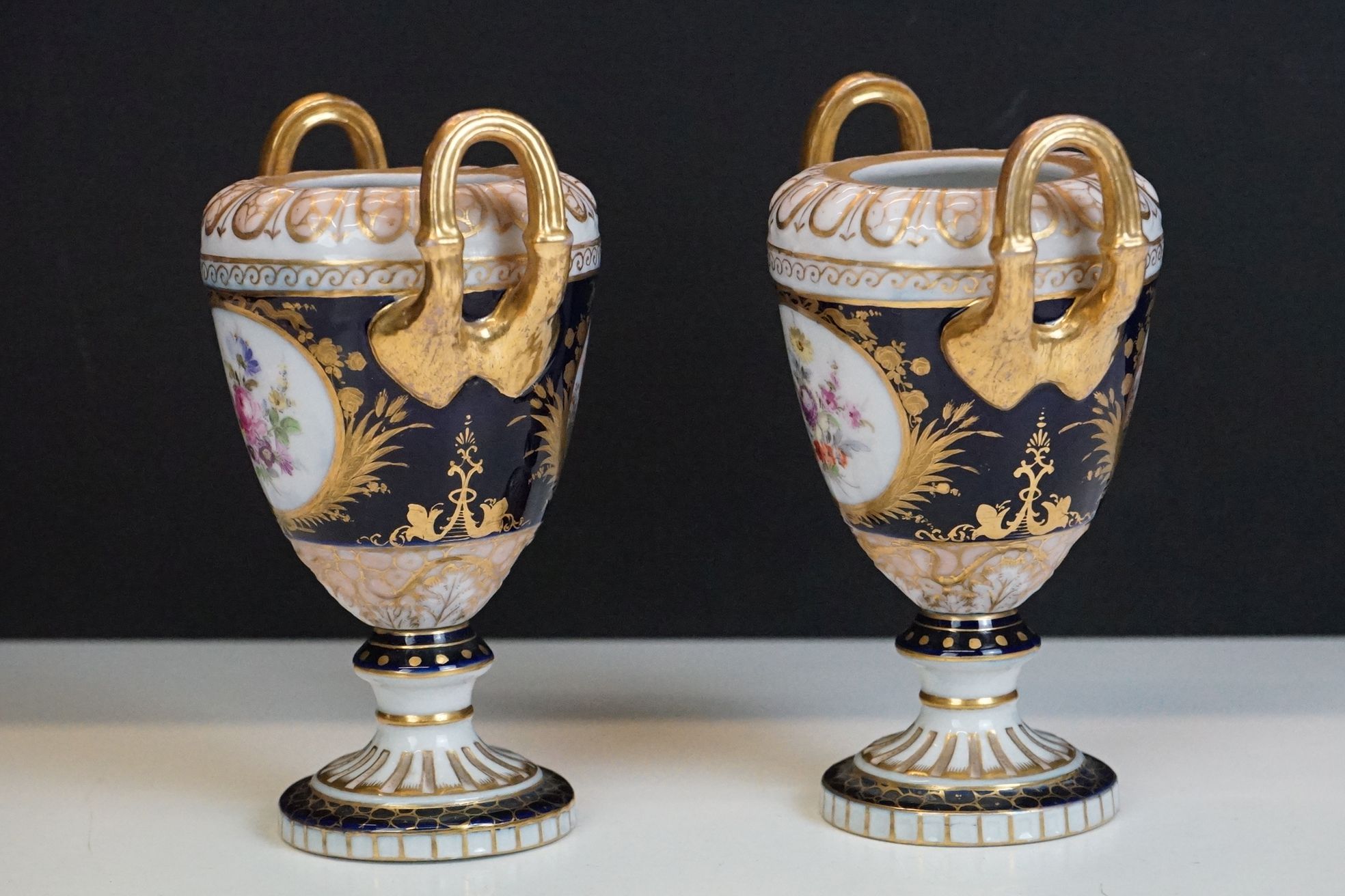 Pair of late 19th / early 20th century Continental porcelain twin-handled urn vases, with hand - Image 3 of 7
