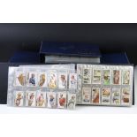 Cigarette cards - Various sets in eight modern binders, varying subjects, to include Wills,