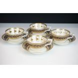 Set of four early 19th century Crown Derby teacups & saucers, with blue and gilt foliate decoration,