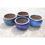 Four Large Blue Glazed Terracotta Garden Planters, each 51cm diameter x 31cm high