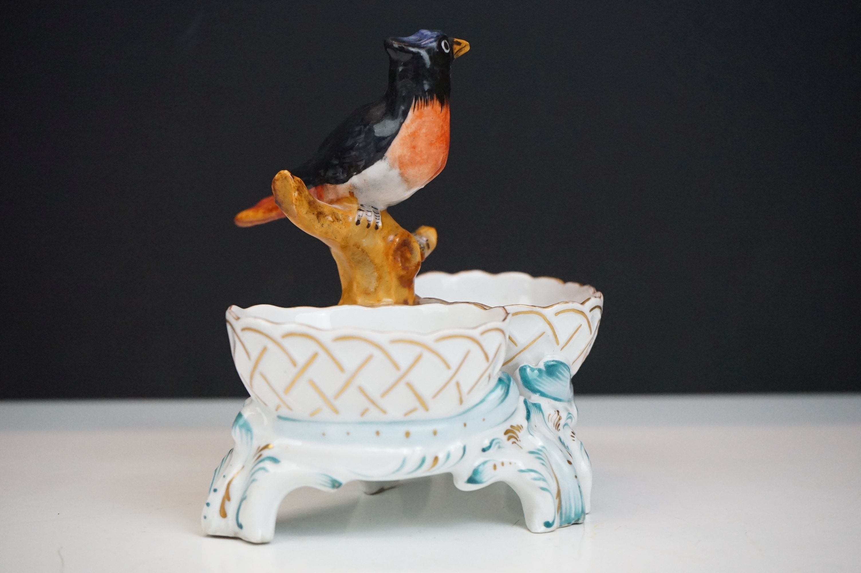 Group of three 19th Century porcelain pieces, comprising: a putti riding a flower encrusted swan, - Image 9 of 19