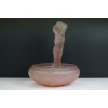 1930's pink pressed glass centrepiece bowl with central figure of a semi-clothed maiden raised on