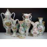 Collection of six 19th Century flower encrusted vases, the largest two-handled vase and cover with