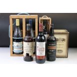 A bottle of Glenturret single malt whisky together with two bottles of vintage port and three