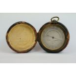 An early 20th century Negretti & Zambra pocket barometer in original fitted case.