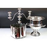A small group of mixed silver plate to include a three branch candelabra and a champagne bucket.