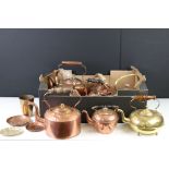 A collection of six antique copper kettles together with a small quantity of brass ware.