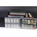 Cigarette cards - Various sets in eight modern binders, varying subjects, to include Players,