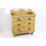 Victorian Painted Pine Chest of Drawers, the shaped gallery back with two small shelves, above two