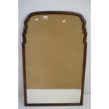 Early 20th century Queen Anne style Walnut Framed Shaped Mirror with bevelled edge, 101cm high x