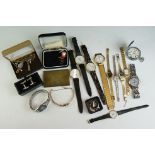 A small collection of ladies and gents wristwatches together with a quantity of cufflinks.