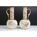 Two Doulton Burselm jugs, printed and painted with floral designs, of globular form with tall