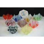 Nine retro 20th century glass handkerchief vases, in varying colours with printed geometric designs,