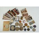A small group of mixed collectables to include coins, badges, collectors cards, lighter and