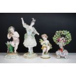 Group of four porcelain figures, comprising a putti holding wheat, a putti with tambourine