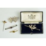 A cased silver thistle brooch within original retailers box and a hallmarked silver Mizpah brooch