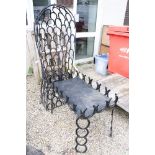 Garden Hooded Chair formed from Horse Shoes, 160cm high together with a similar Garden Table, 83cm
