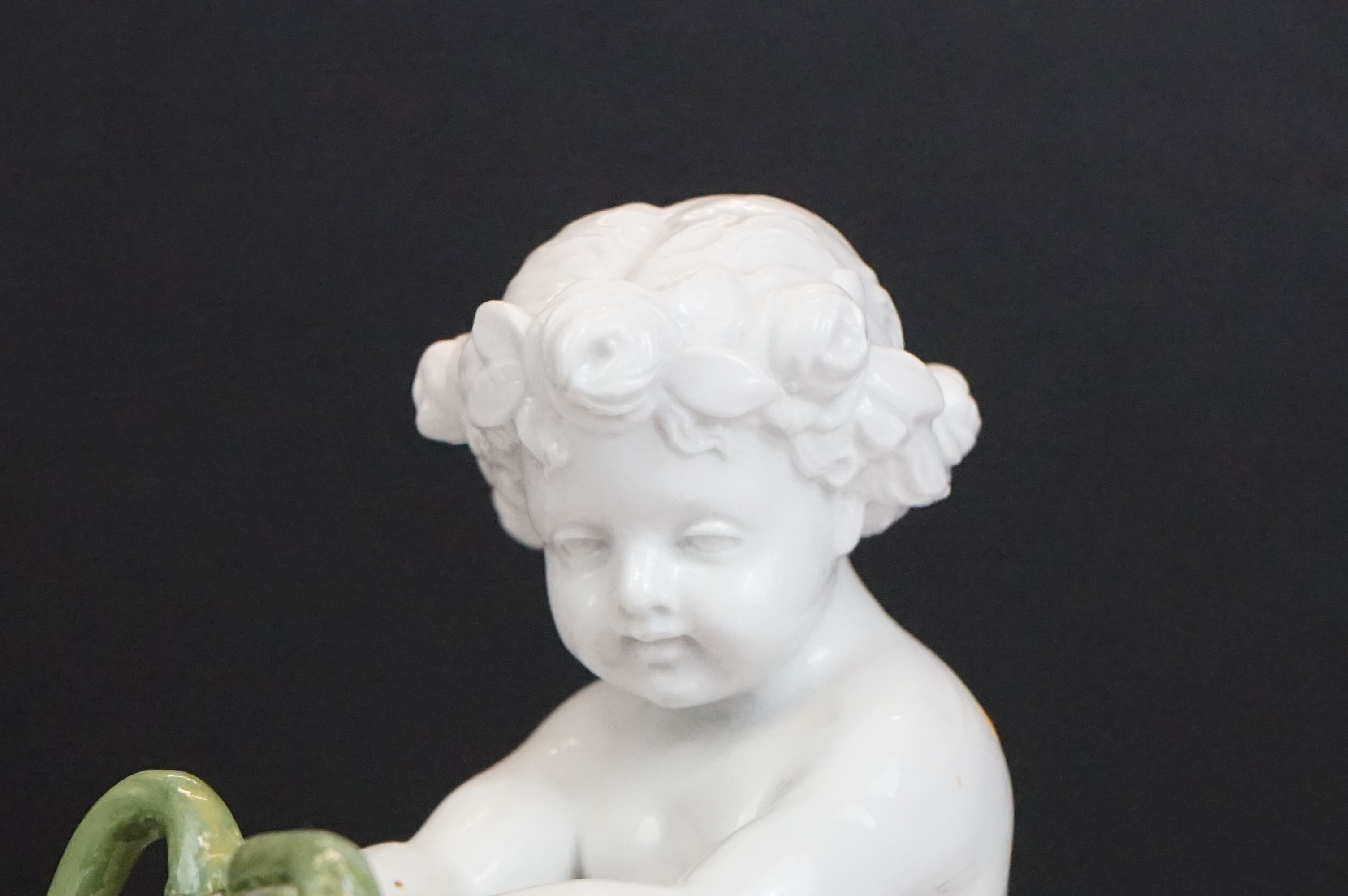 Group of three 19th Century porcelain pieces, comprising: a putti riding a flower encrusted swan, - Image 17 of 19