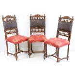 Set of Eight Victorian style Dining Chairs, the carved backs with embossed leather panels and