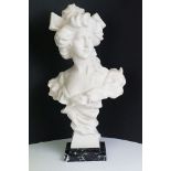 20th Century composition bust of a classical maiden with ribbon in hair, raised on a marble base.